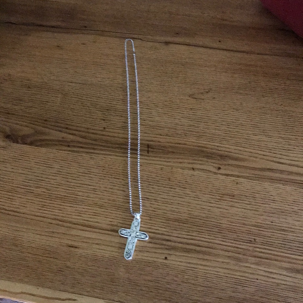 Cross necklace about 30 inc. long.